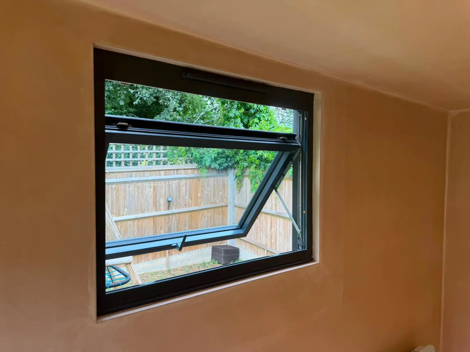 Desk by window inside garden office
