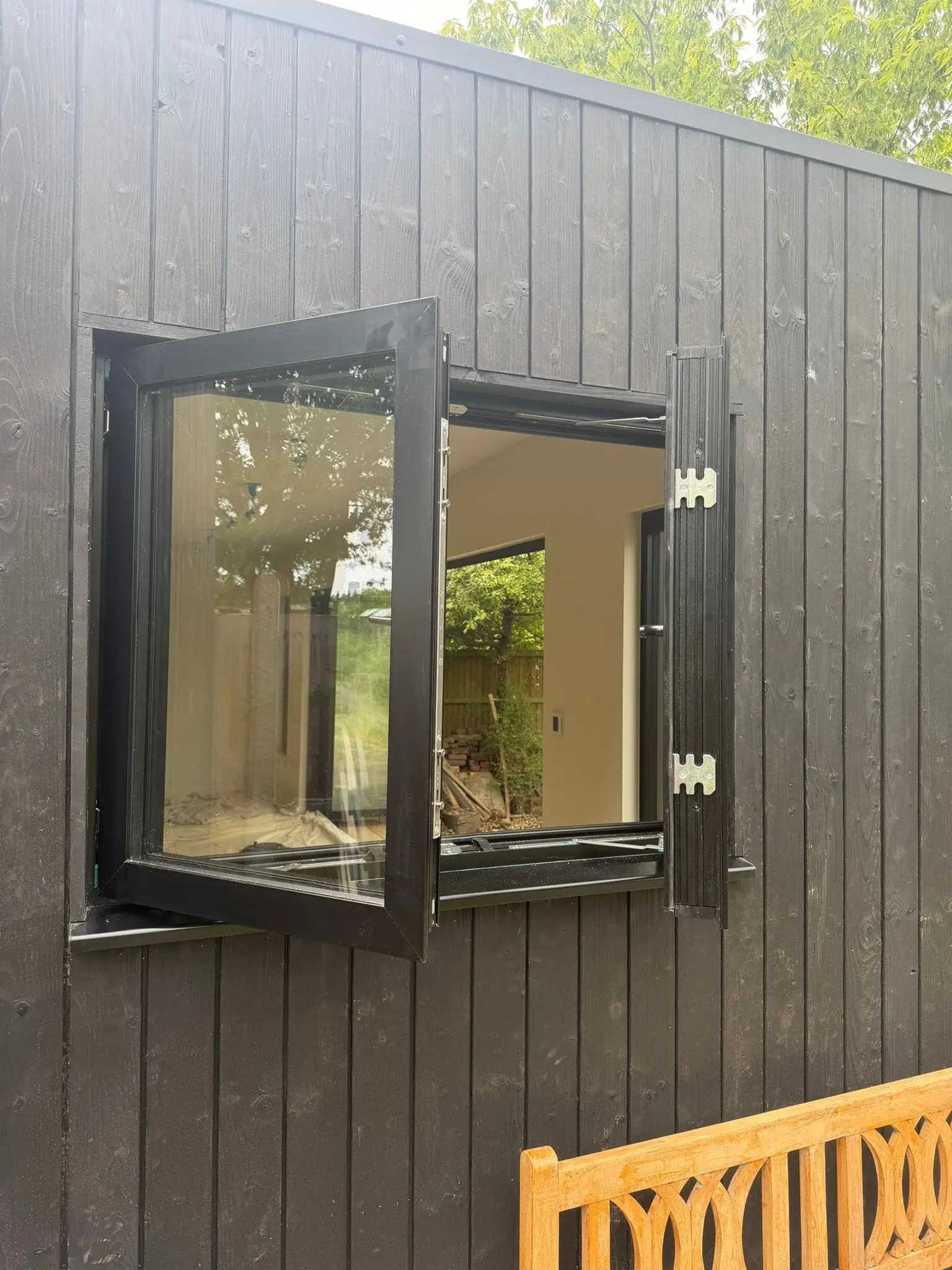 French window open on garden room exterior