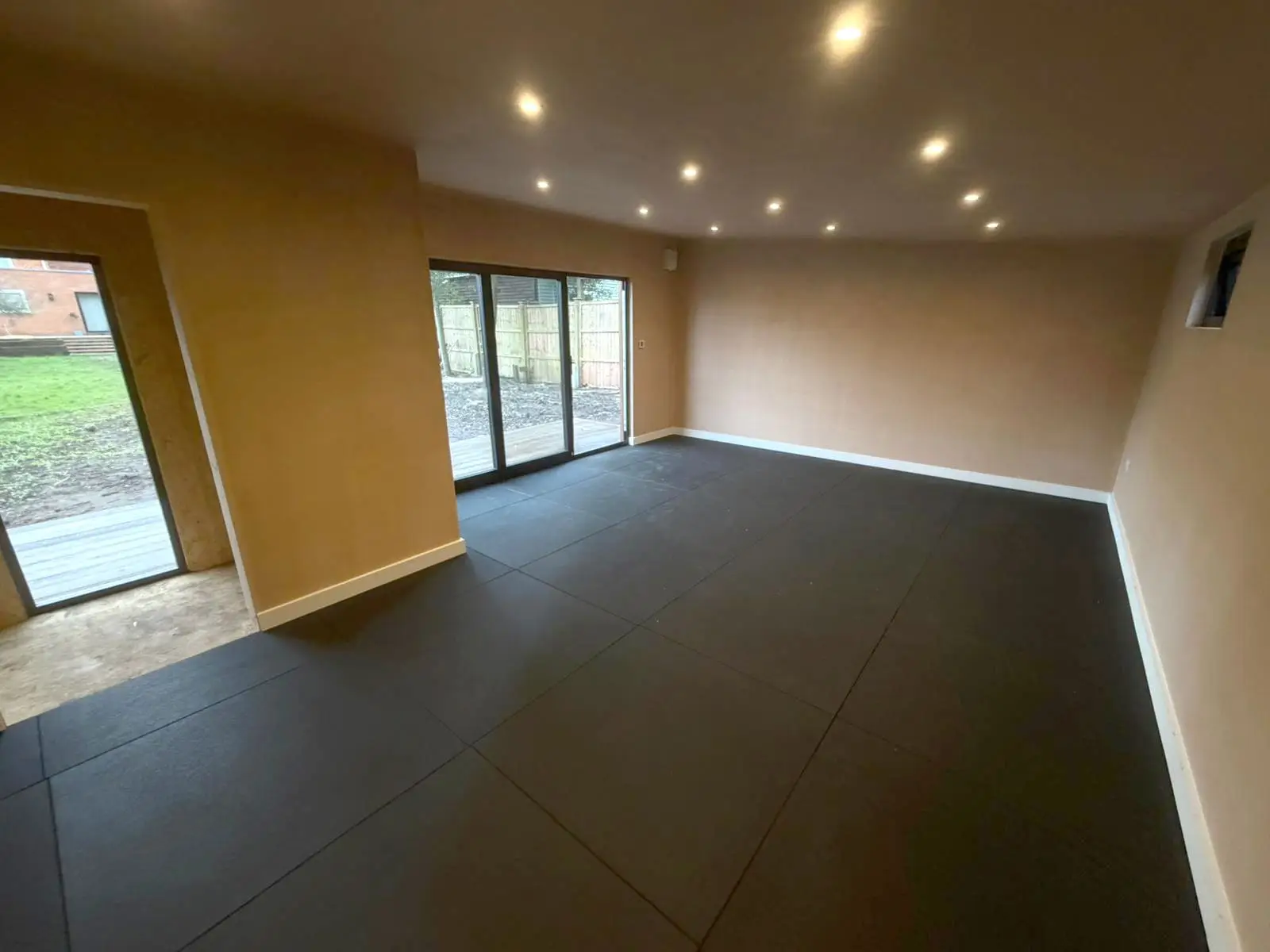 Flooring in an extended height garden gym