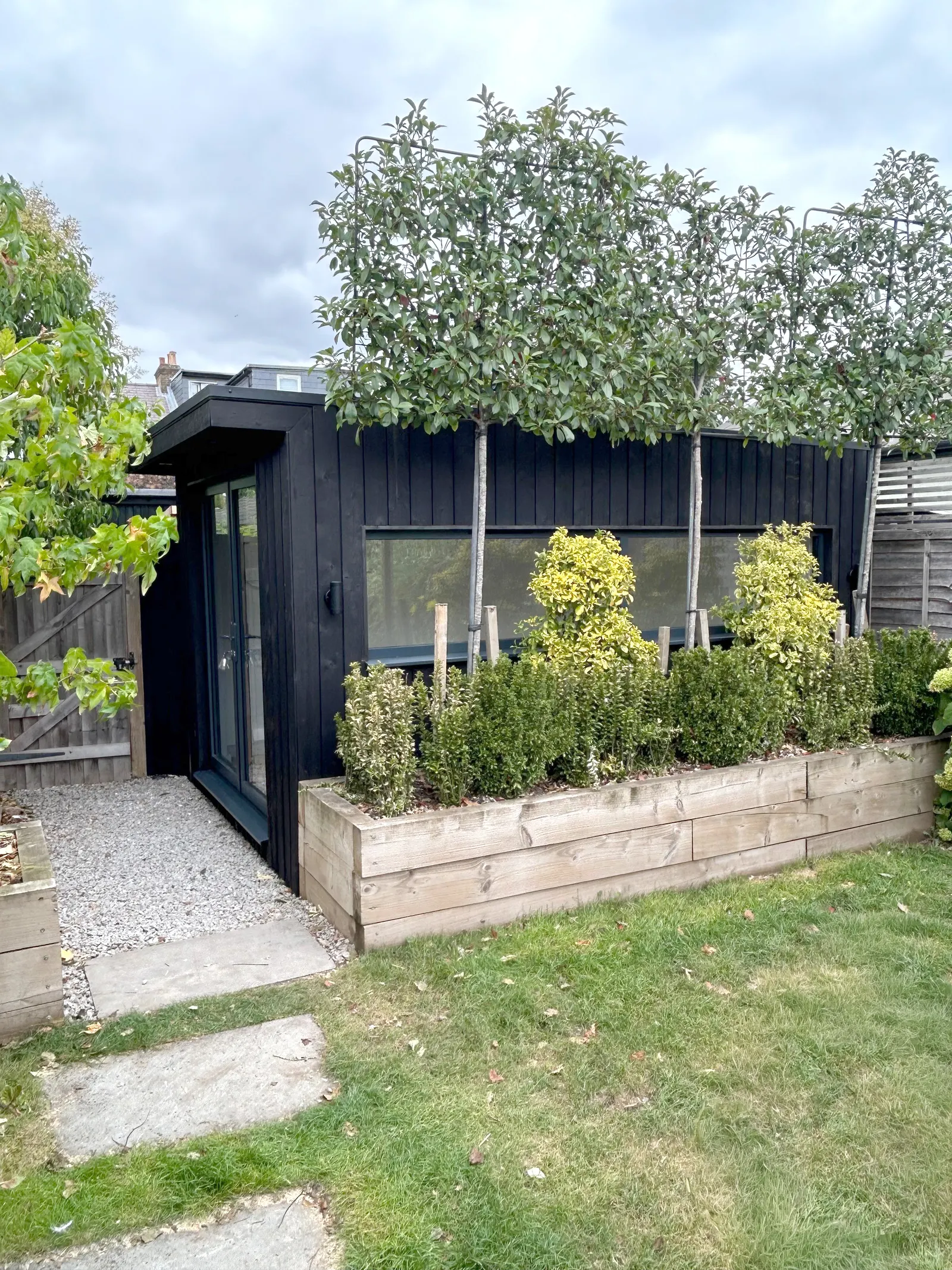 Garden office exterior — boundary build replacing old shed and fence