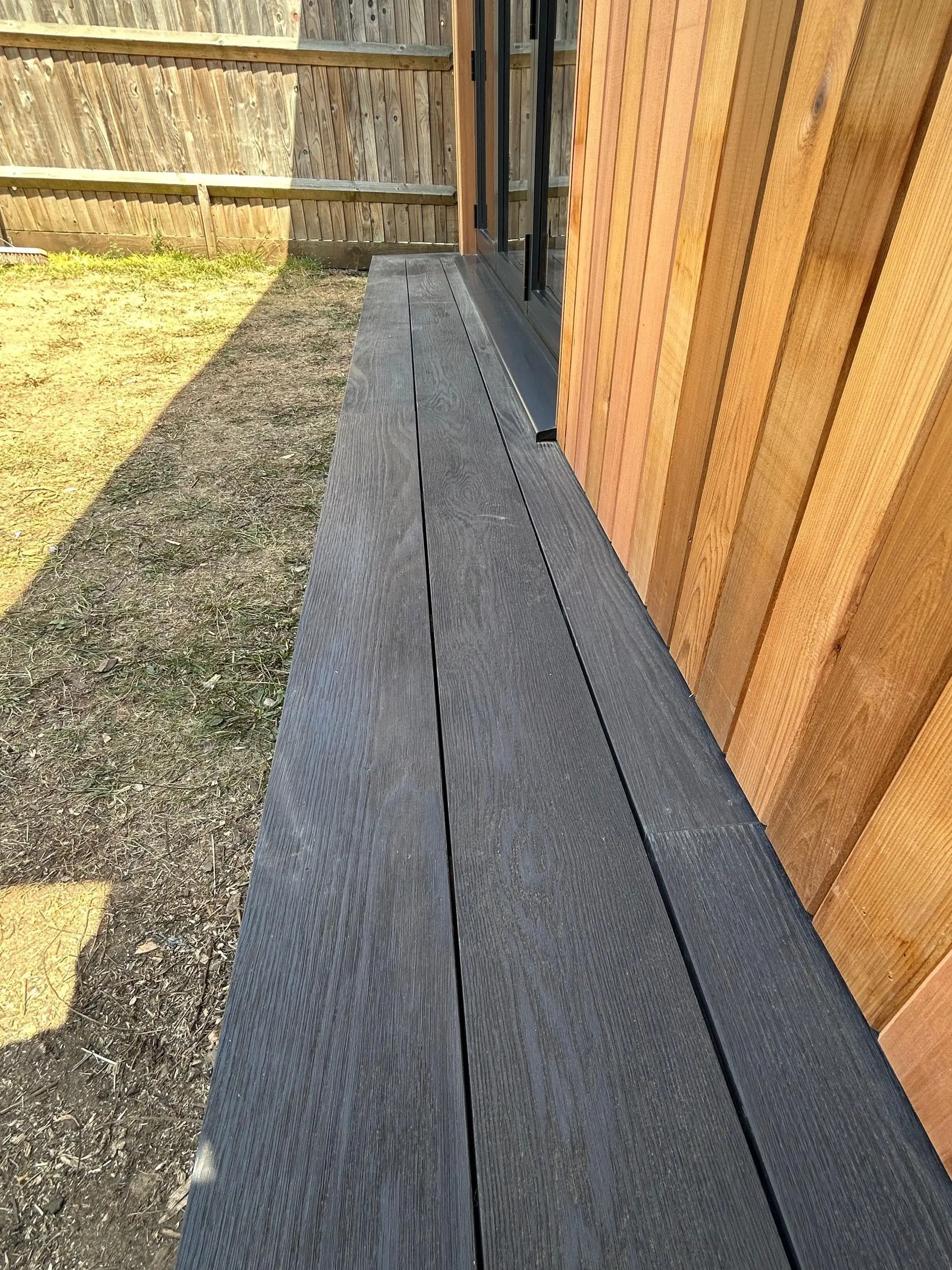 Millboard composite step in burnt cedar